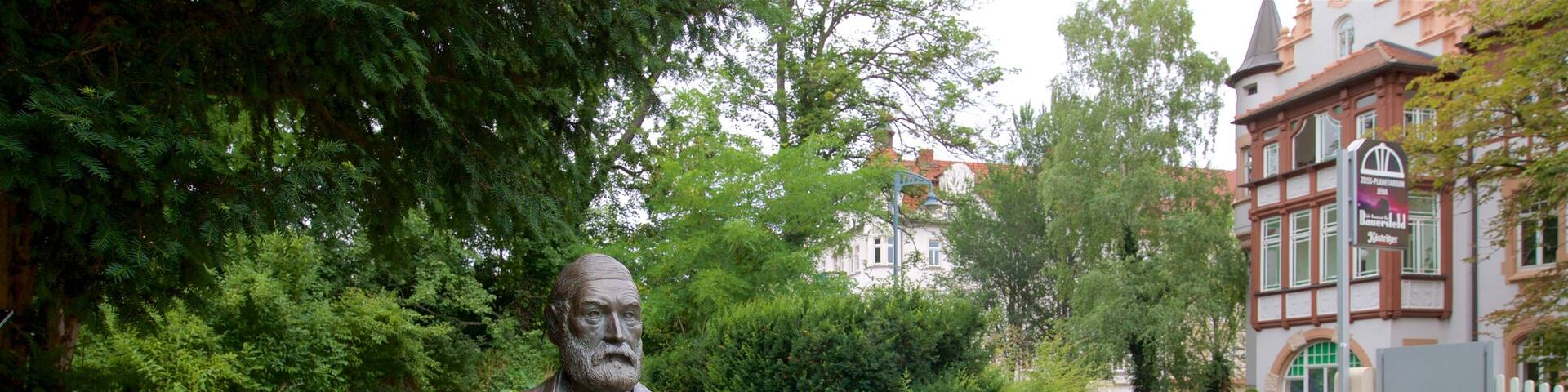 Zeiss Planetarium showing a statue or sculpture and a garden
