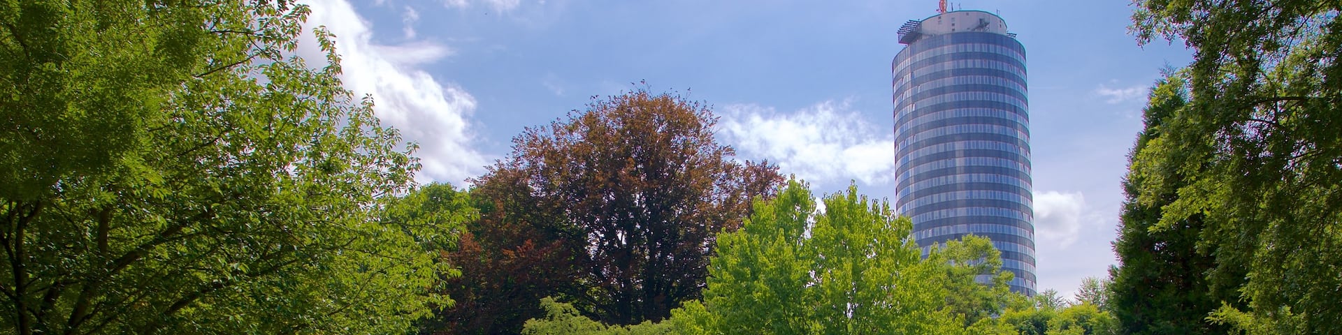 Botanischer Garten welches beinhaltet Park und Hochhaus