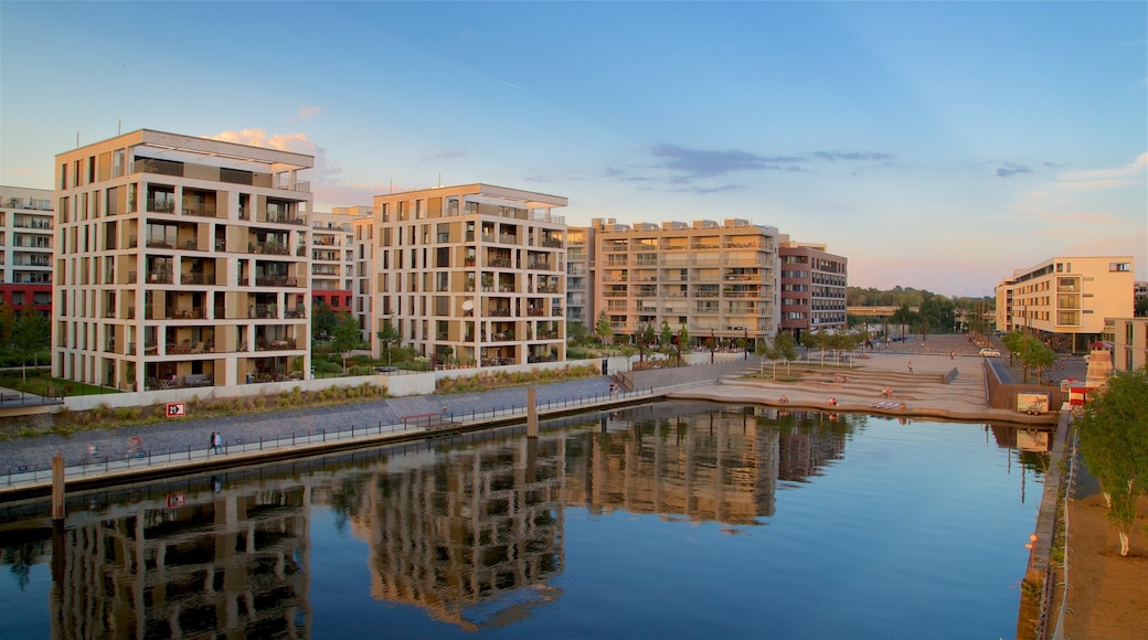 Offenbach am Main which includes a city, a sunset and a lake or waterhole