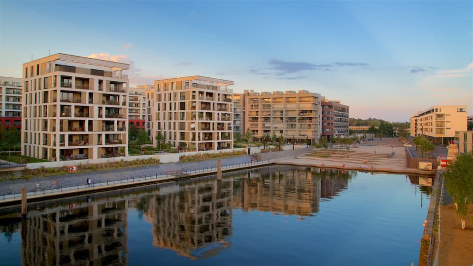 Offenbach am Main showing a lake or waterhole, a sunset and a city
