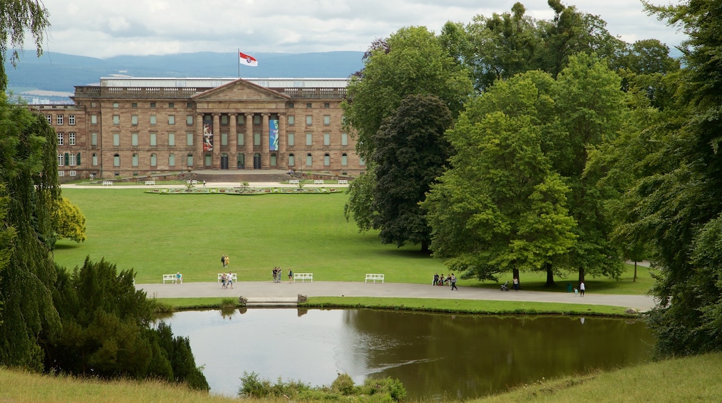 Schloss Wilhelmshoehe which includes a pond, heritage architecture and a park