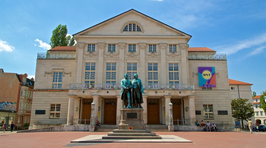 Goethe-Schiller Monument which includes a square or plaza, a statue or sculpture and heritage architecture