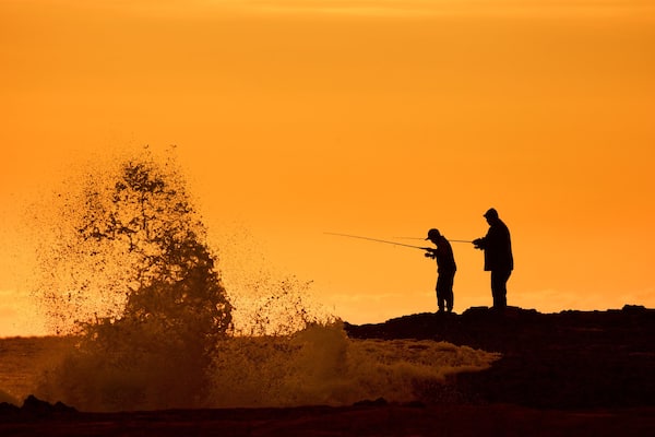 Snapper Rocks featuring fishing, general coastal views and a sunset