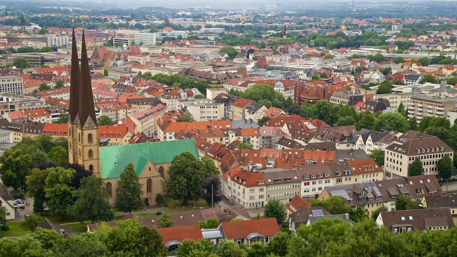 Sparrenberg Castle which includes heritage architecture, landscape views and a city