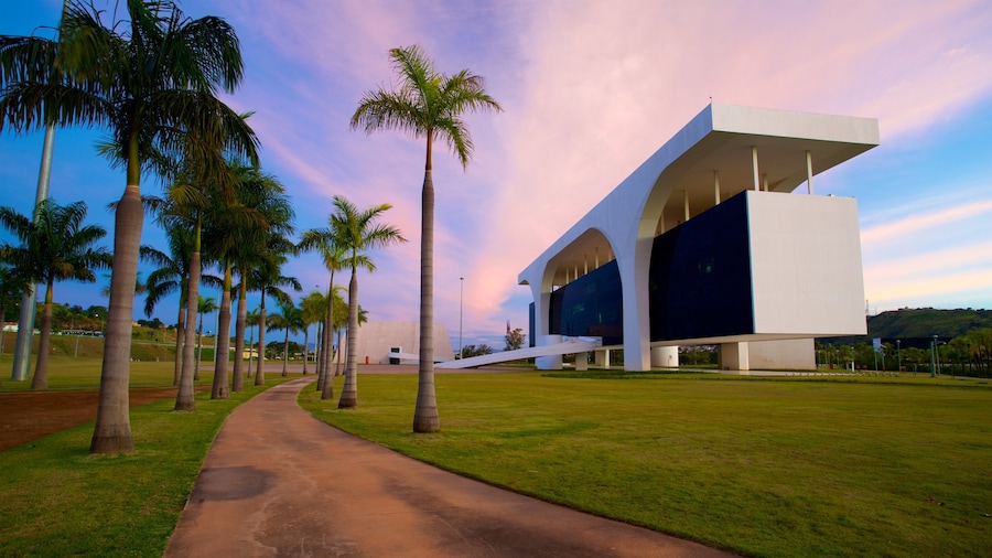 Belo Horizonte which includes modern architecture, a garden and a sunset
