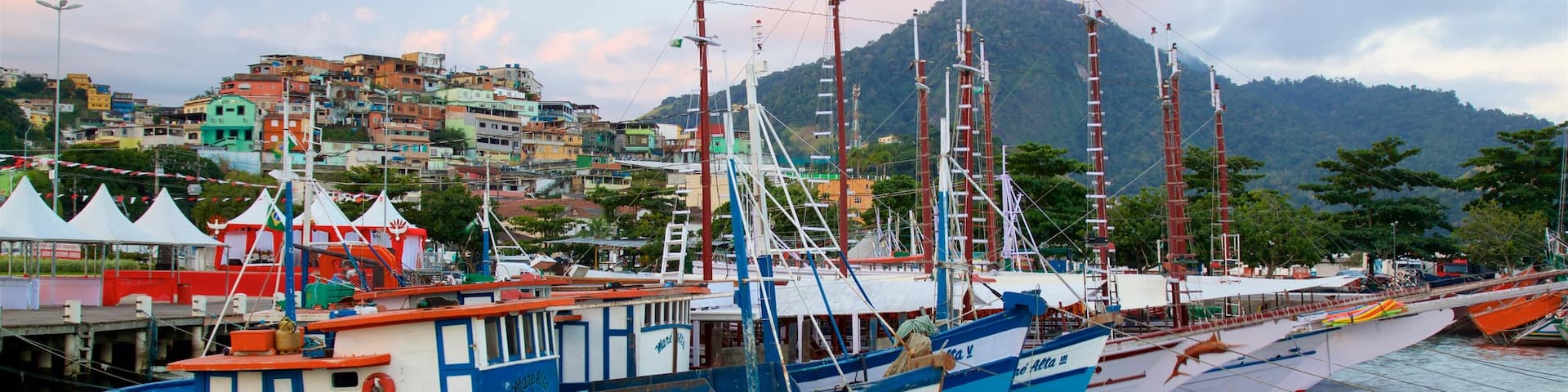 Cais Turistico de Santa Luzia showing a bay or harbor and a coastal town