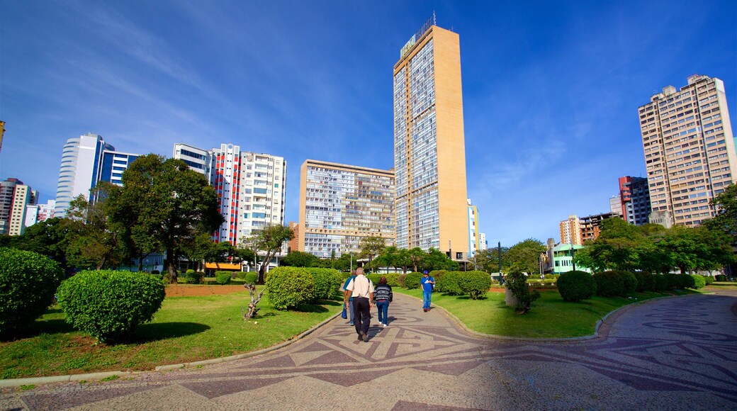 Raul Soares Square showing a city as well as a small group of people