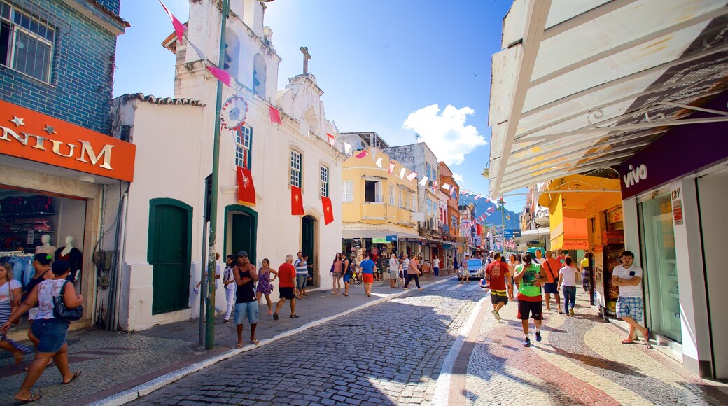 Santa Luzia Church showing a small town or village and street scenes as well as a small group of people