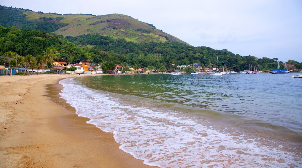 Biscaia Beach featuring a coastal town, a sandy beach and general coastal views