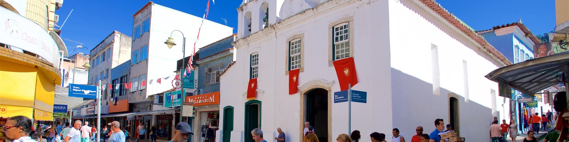 Santa Luzia Church showing street scenes and a small town or village as well as a small group of people