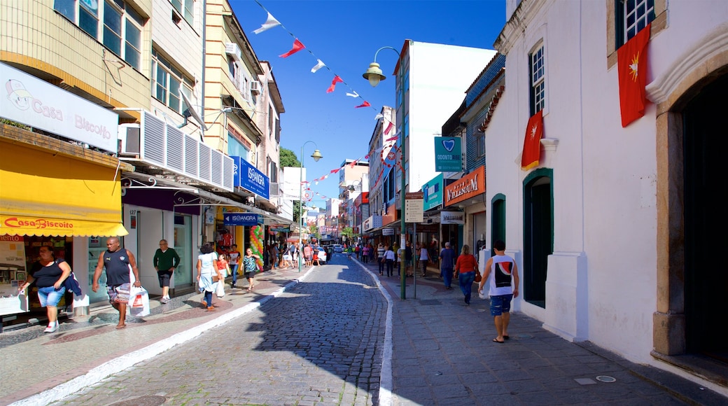 Santa Luzia Church showing street scenes and a small town or village as well as a small group of people