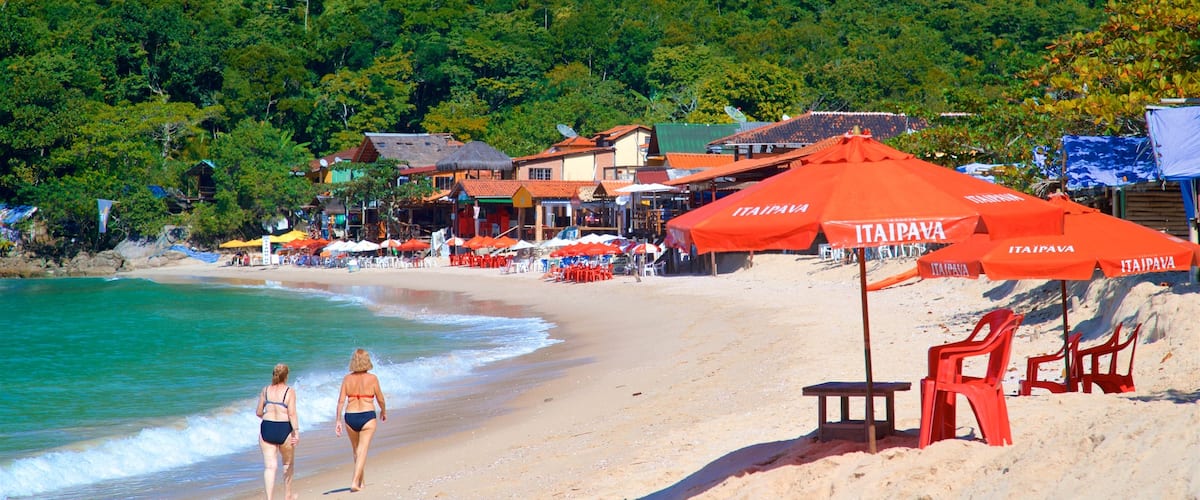 Ranch Beach featuring tropical scenes, a coastal town and a sandy beach