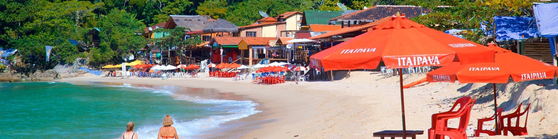 Ranch Beach featuring tropical scenes, a coastal town and a sandy beach