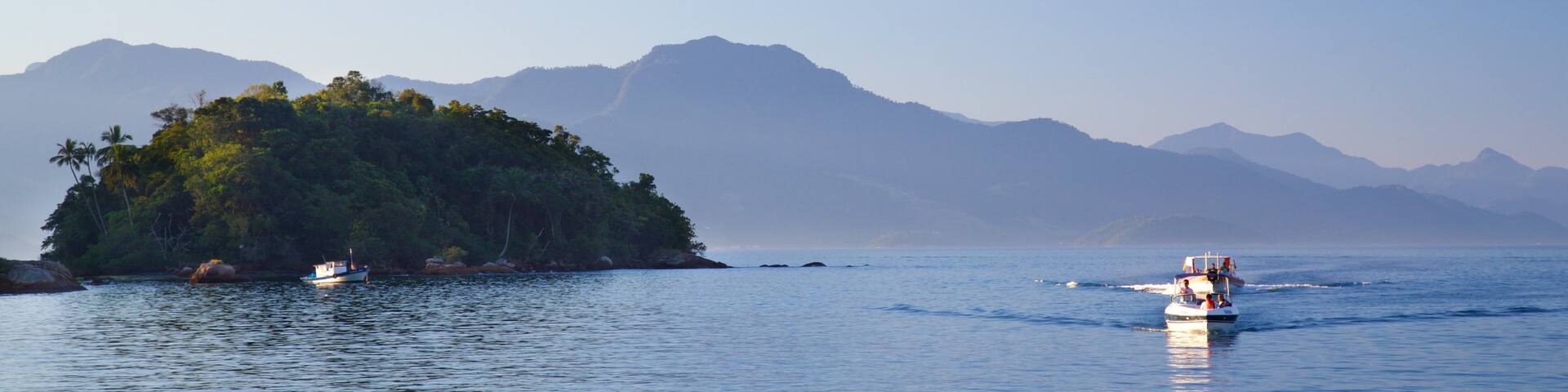 Abraao Beach which includes general coastal views, boating and island views