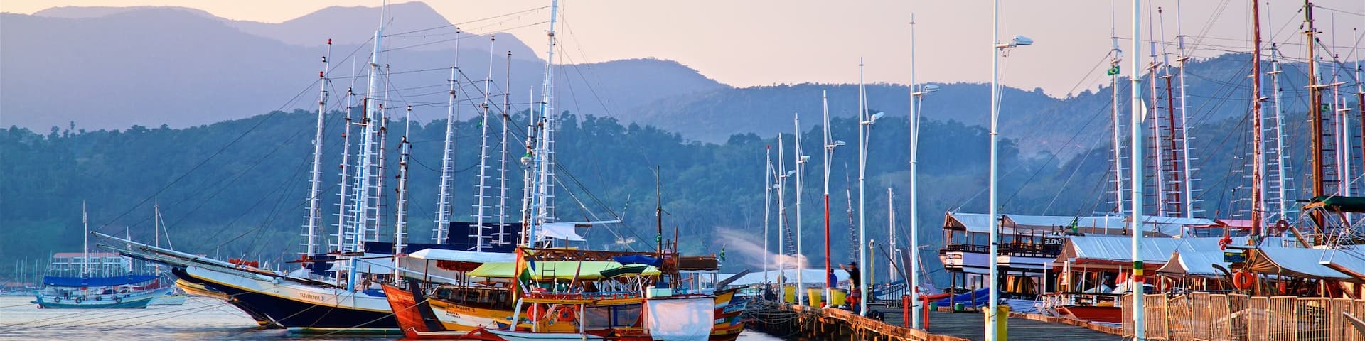 Paraty Wharf which includes a sunset and a bay or harbor