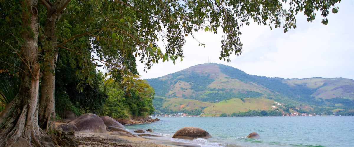 Plage Praia Da Egua mettant en vedette vues littorales, plage et scènes tropicales