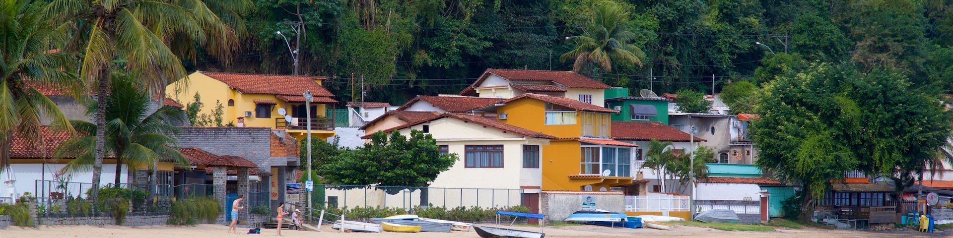 Biscaia Beach featuring a sandy beach, a coastal town and general coastal views