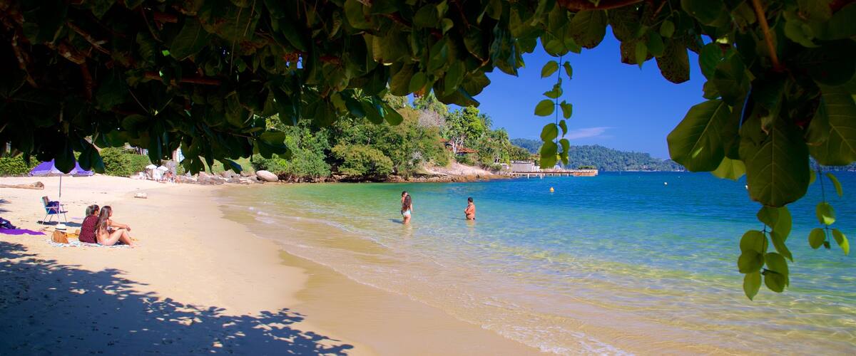 Figueira Beach featuring swimming, tropical scenes and general coastal views