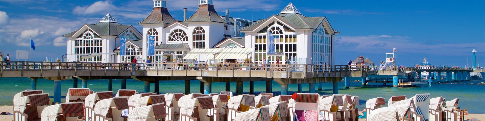 Sellin Pier featuring a beach and general coastal views