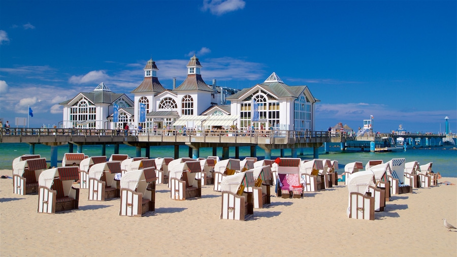Sellin Pier showing a sandy beach and general coastal views
