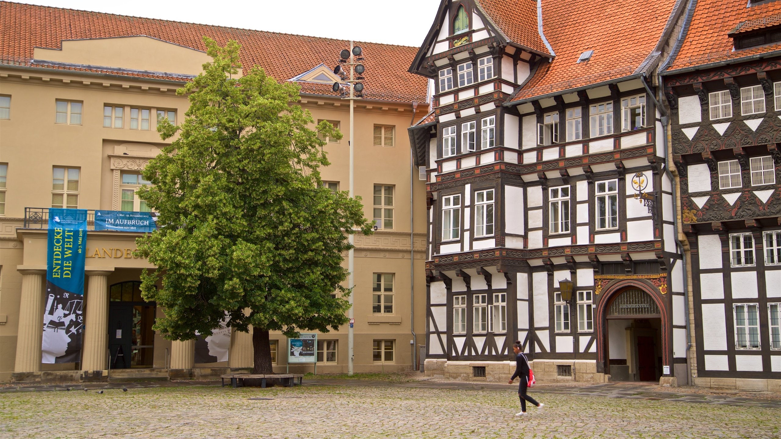 Castle Square featuring heritage elements and street scenes as well as an individual child