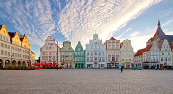 New Market featuring a square or plaza, a sunset and a city