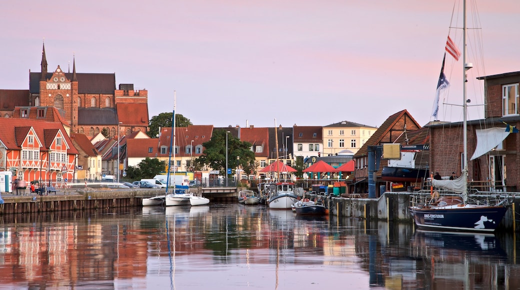 Wismar featuring a sunset and a bay or harbour