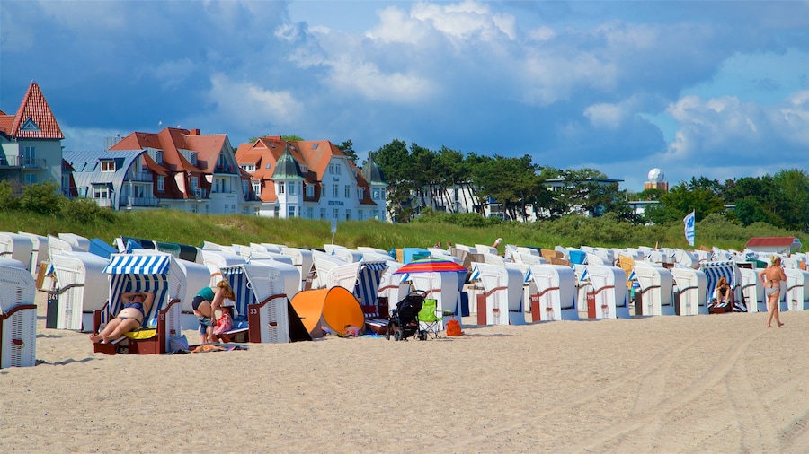 Warnemunde Beach which includes a sandy beach and general coastal views