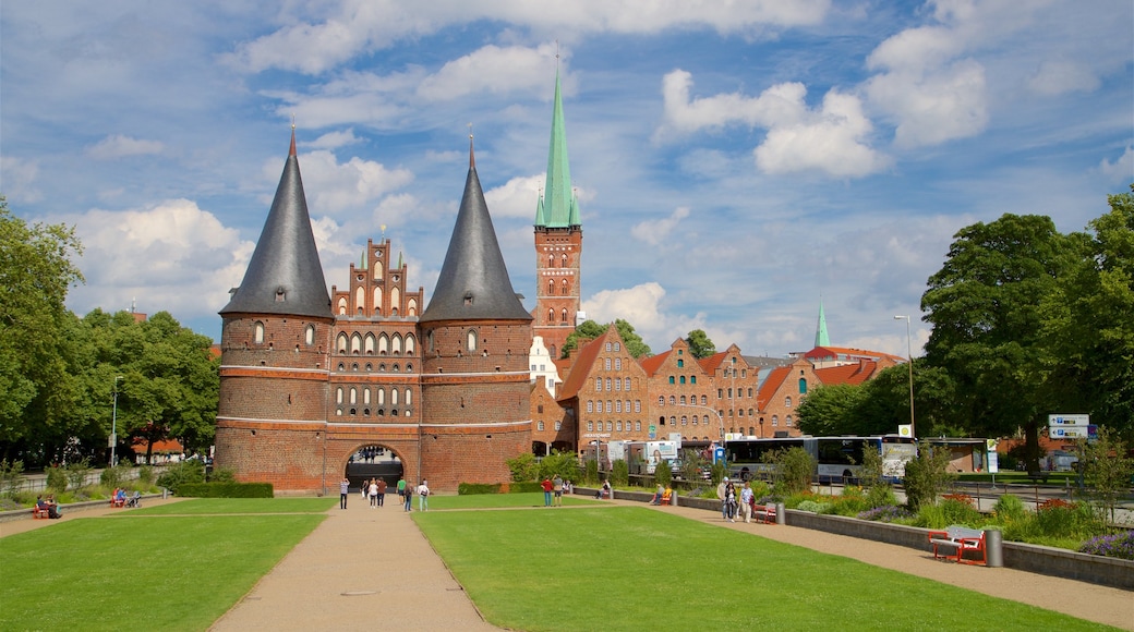 Museum Holstentor showing heritage architecture and a garden