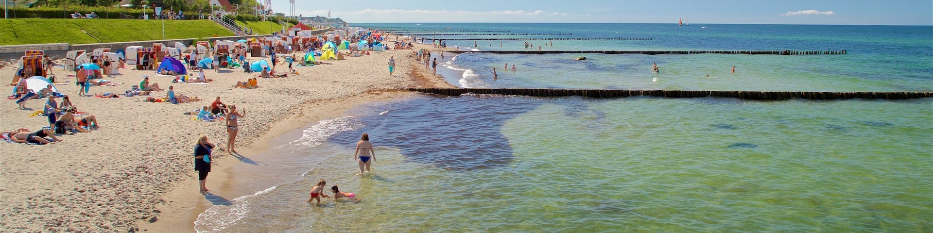 Kuehlungsborn Beach featuring general coastal views and a beach as well as a large group of people