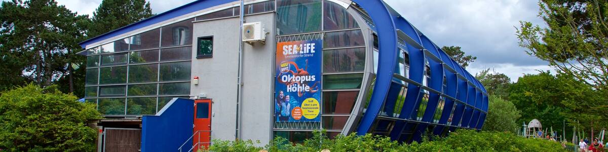 SEA LIFE Timmendorfer Strand featuring signage as well as a couple