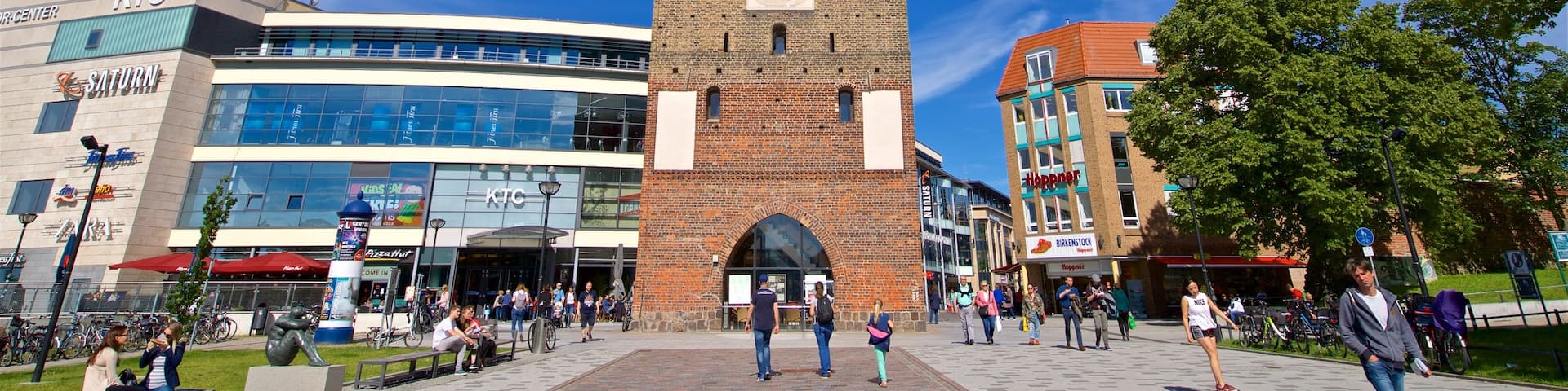 Kröpeliner Tor featuring street scenes and heritage architecture as well as a small group of people