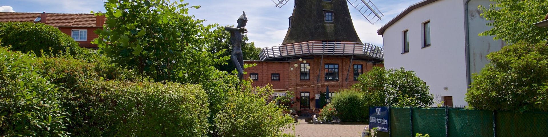 Meyers Mill showing a windmill