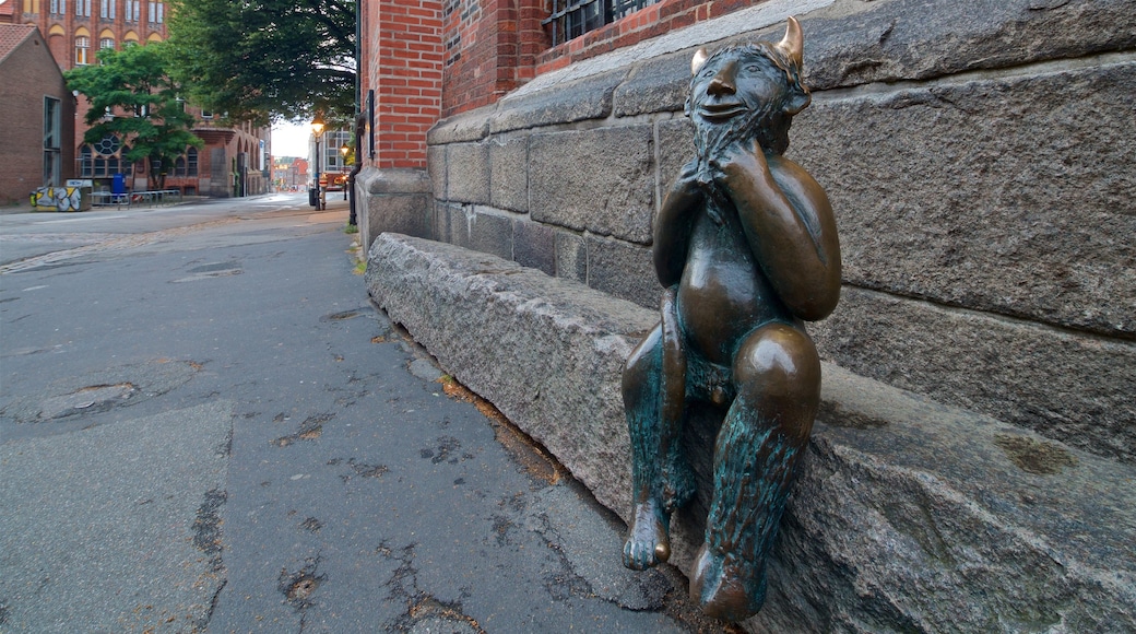 Marienkirche featuring outdoor art and a statue or sculpture