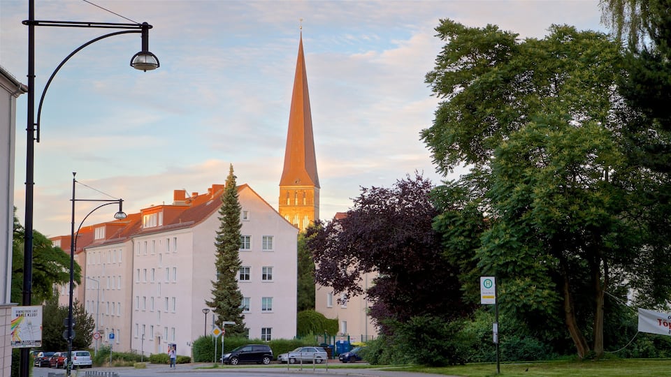 Petrikirche which includes heritage architecture and a sunset