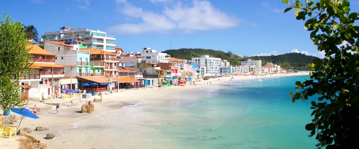 Prainha Beach showing a beach, a coastal town and general coastal views