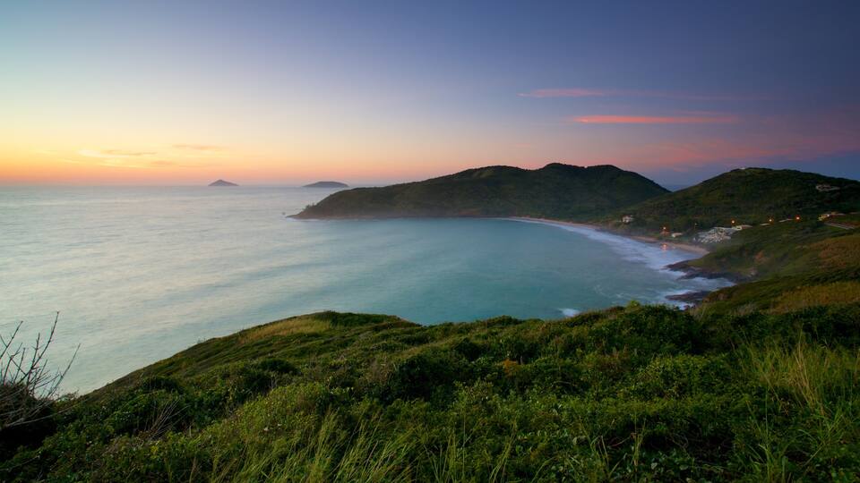 Joao Fernandes Viewpoint which includes a sunset, landscape views and general coastal views