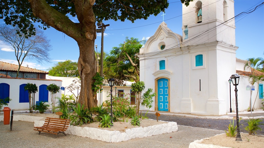Chiesa di San Benedetto mostrando piccola città o villaggio, architettura d\'epoca e chiesa o cattedrale