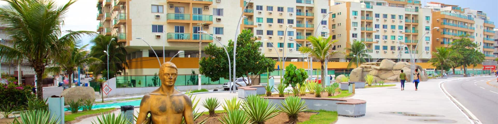 Aguas Square featuring a statue or sculpture, outdoor art and a park