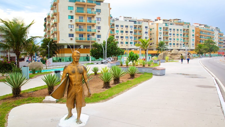 Praça das Águas mostrando arte urbana, statua o scultura e giardino