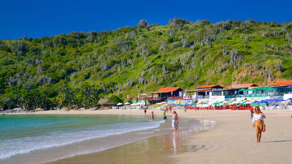 Playa de Conchas que incluye una playa, vistas generales de la costa y una ciudad costera