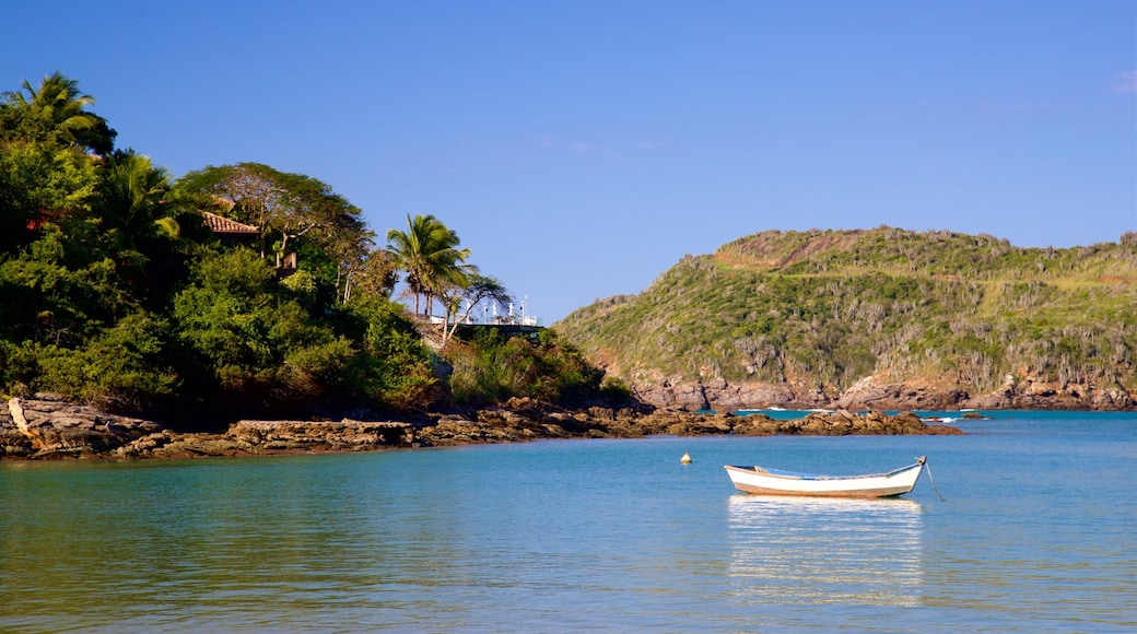 Ferradura Beach showing rocky coastline and general coastal views