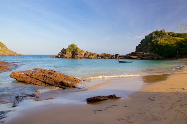 Plage de Ferradurinha montrant vues littorales, côte rocheuse et plage de sable