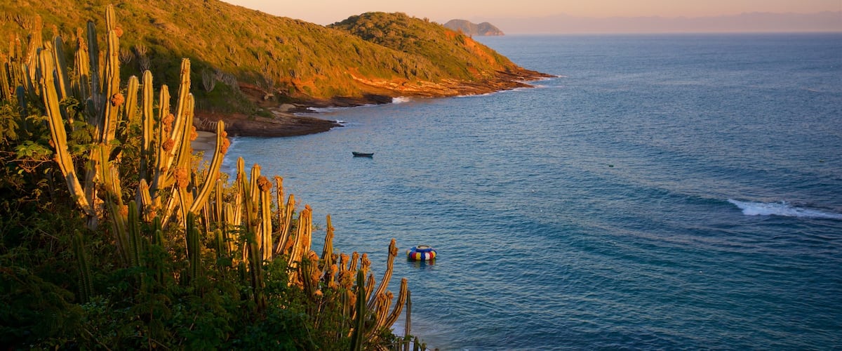 Joao Fernandes Viewpoint showing landscape views, a sunset and general coastal views