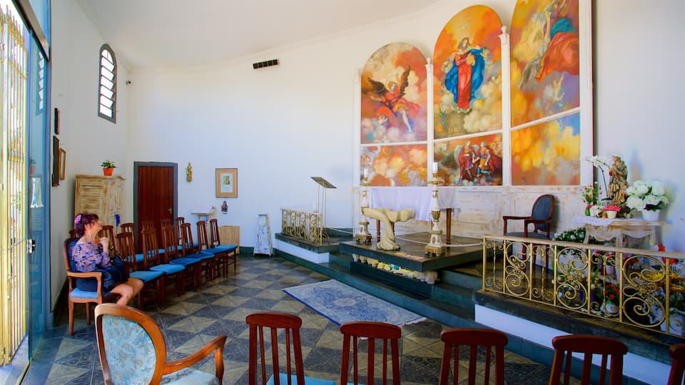 Chapel of Our Lady Desatanudos featuring art, religious elements and interior views
