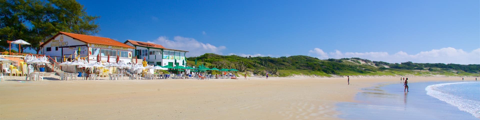 Conchas Beach featuring a sandy beach, general coastal views and a coastal town