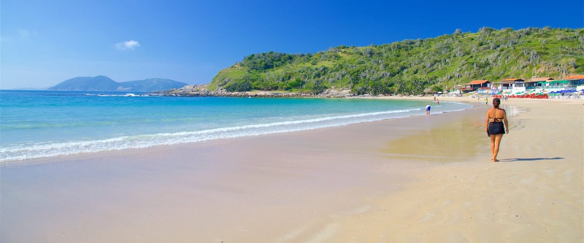 Conchas Beach featuring a sandy beach, a coastal town and general coastal views