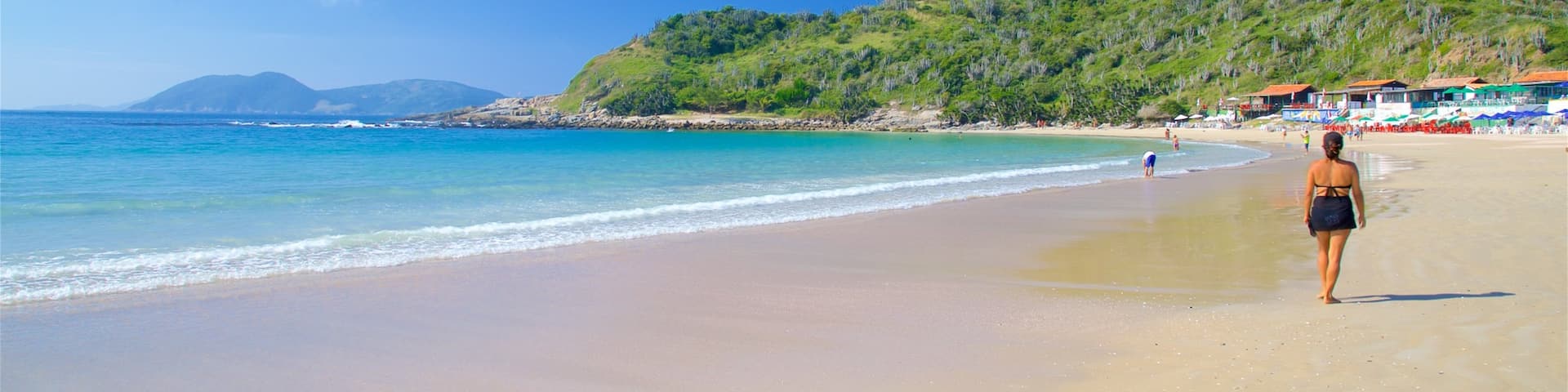 Conchas Beach featuring a sandy beach, general coastal views and a coastal town
