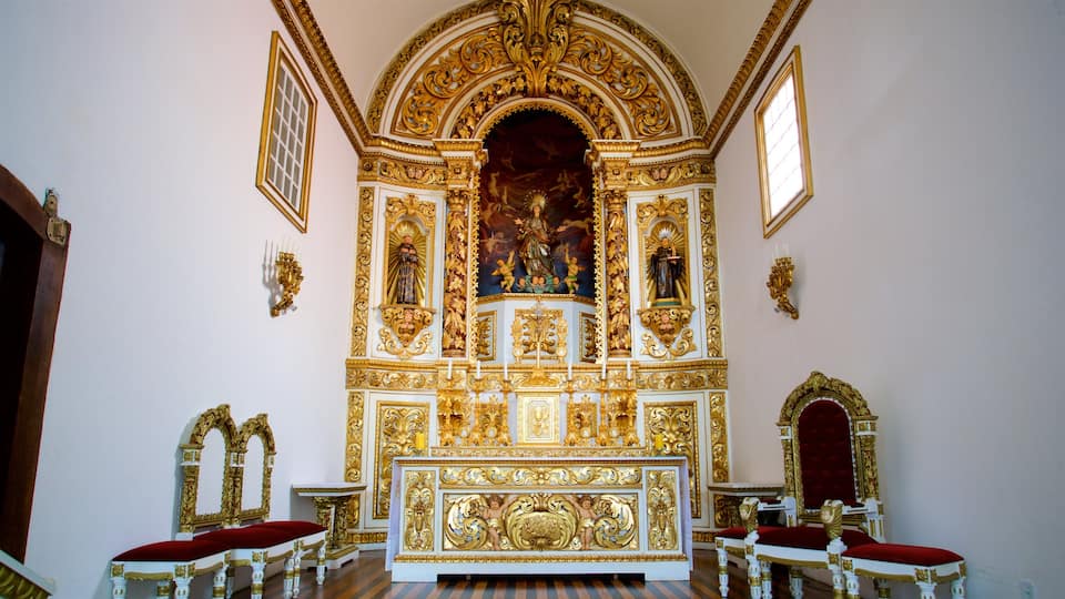 Parish Our Lady of the Assumption of Cabo Frio which includes a church or cathedral, interior views and heritage elements