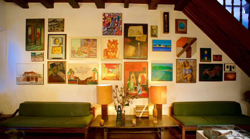 Casa-Atelie Carlos Scliar Museum which includes interior views and art